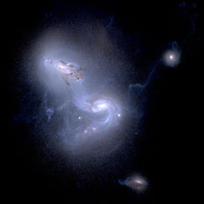 two simulated galaxies in the early stages of a collision