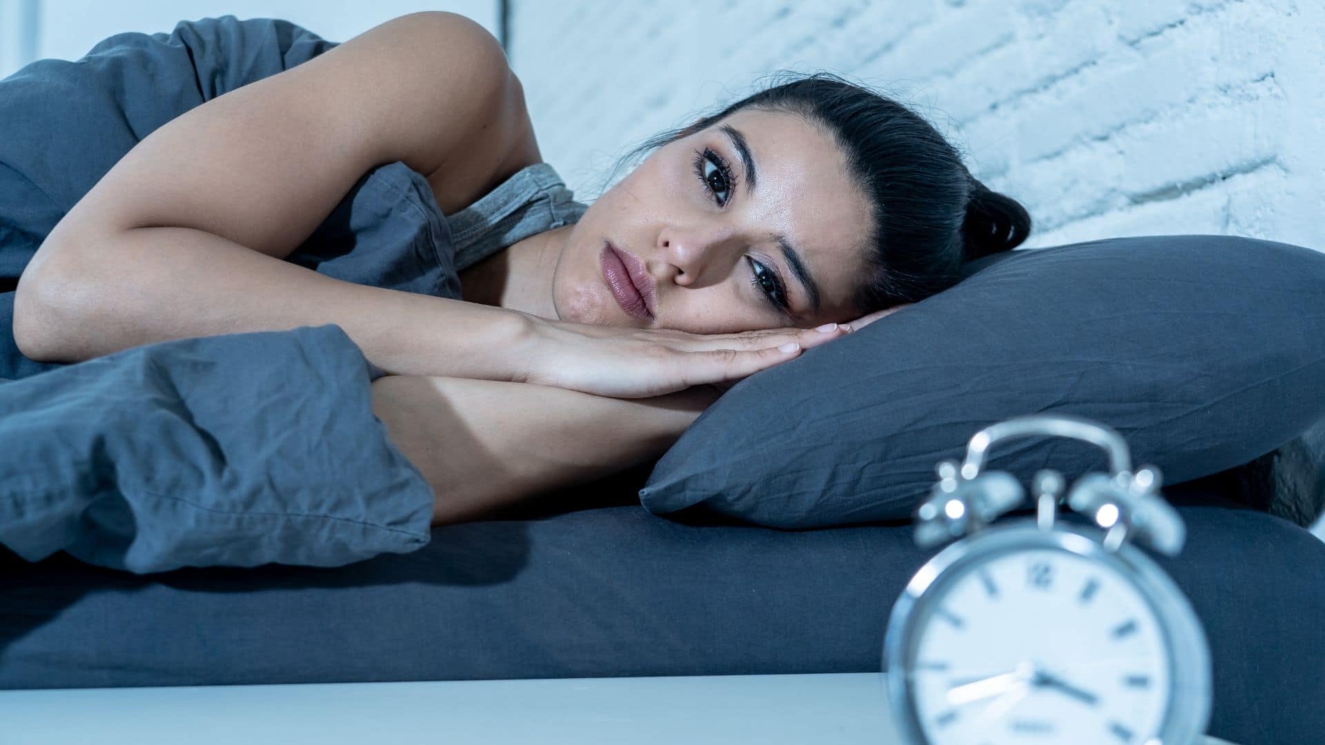 Image showing woman having difficulty getting sleep