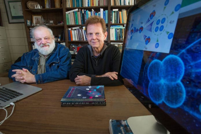 Andrey Shirokov, left, of Moscow State University in Russia, who has been a visiting scientist at Iowa State, and James Vary of Iowa State are part of an international team of nuclear physicists who theorized, predicted and announced a four-neutron structure in 2014 and 2016. Archive photo by Christopher Gannon for the College of Liberal Arts and Sciences.