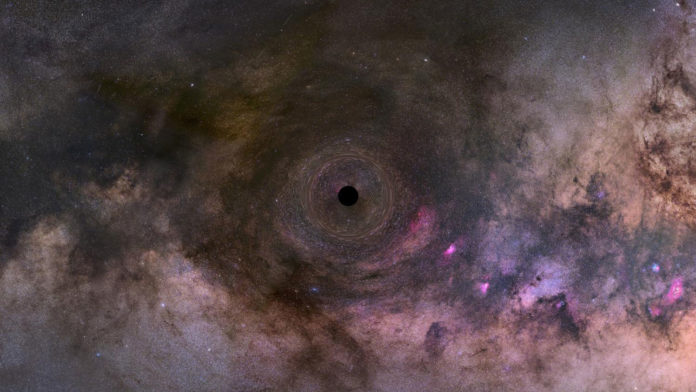 This is an illustration of a close-up look at a black hole drifting through our Milky Way galaxy