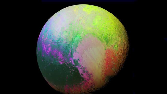 Pluto is shown in a rainbow of colors that distinguish the different regions on the planet.