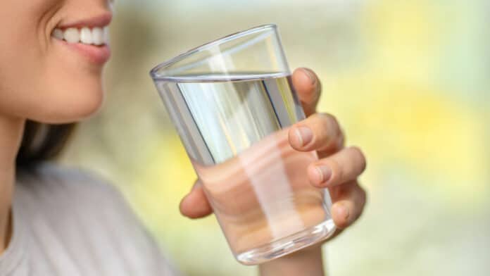 Image showing a girl drinking glass of water