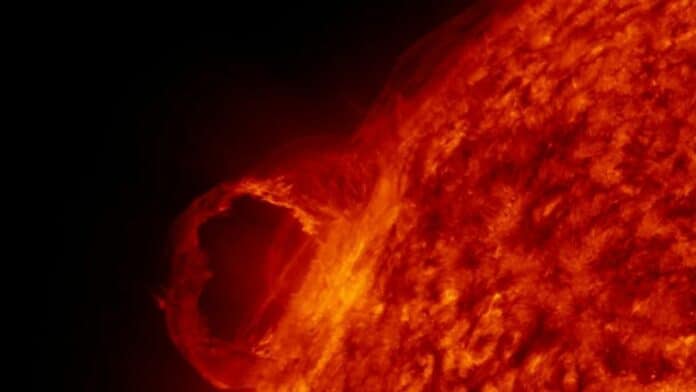 Image illustrating solar flare erupting from sun