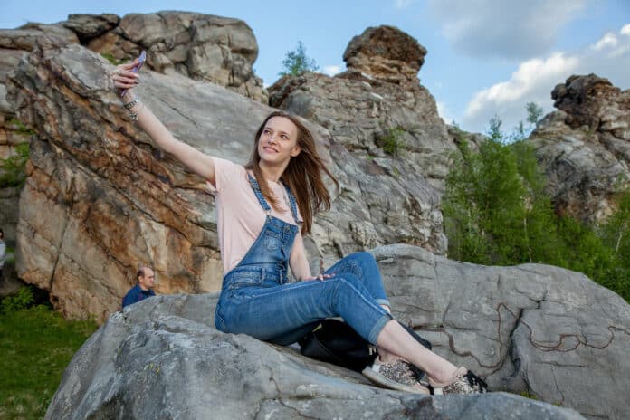 Image showing a woman taking selfies
