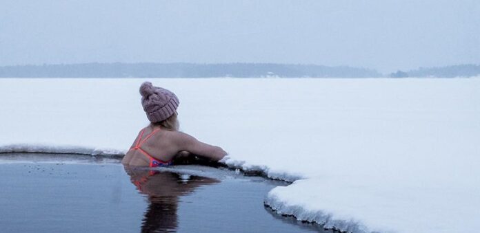 Image showing women swimming in cold water.