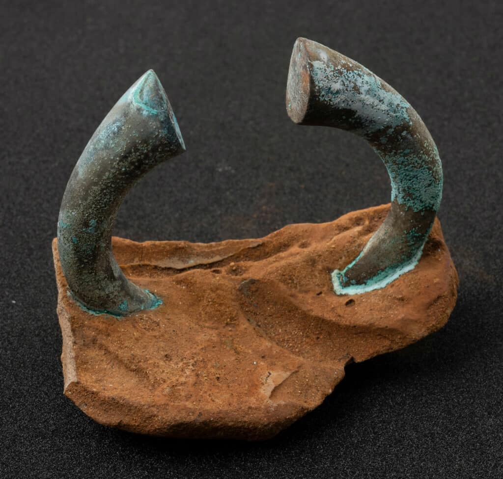 Detail of a manilla bracelet concreted to part of a pot from a Flemish trader excavated by the Sociedad de Ciencias Aranzadi off Getaria, Basque Country, northern Spain. The ship, lost in 1524, had been chartered by Portuguese merchants from Lisbon.