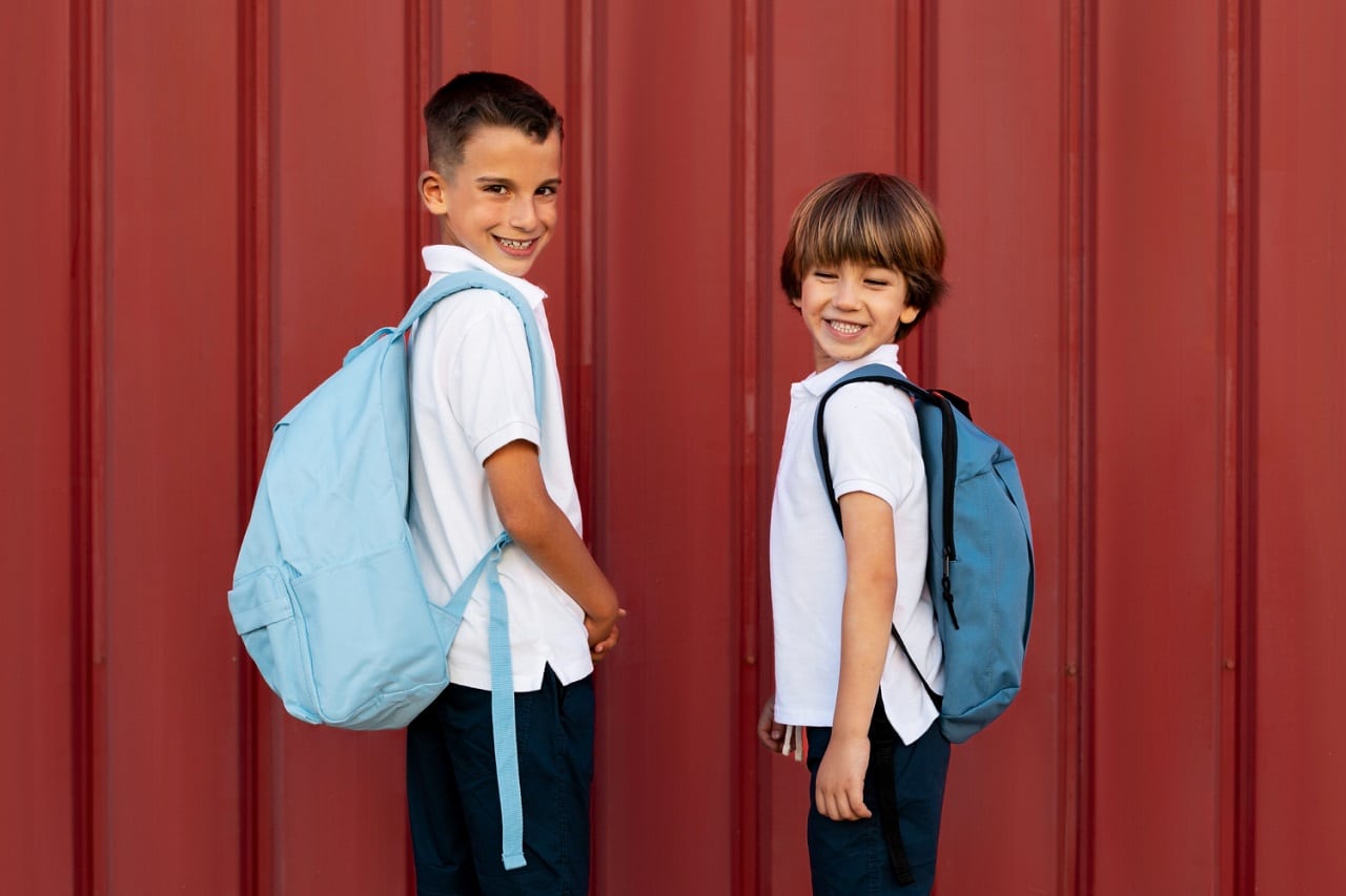 The benefits of later school entry extend to younger siblings