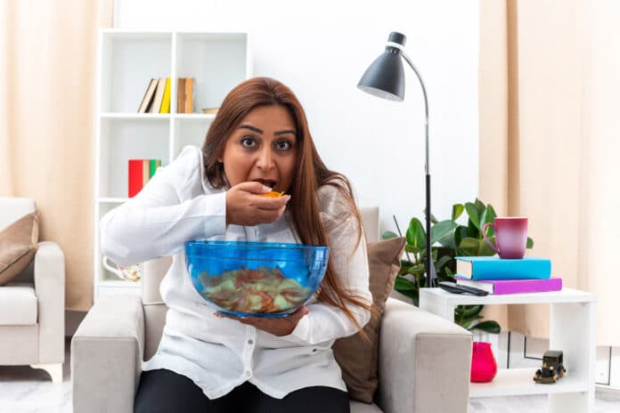 Image showing woman having food in stress