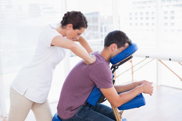 Image showing man having back massage.