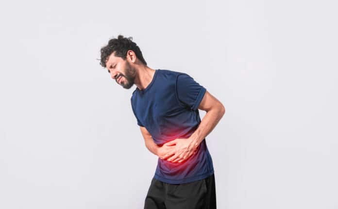 Image showing man with stomach problems