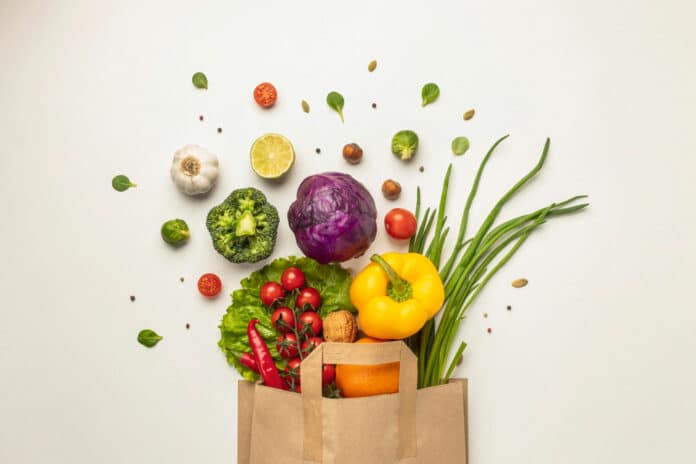 view of assortment of vegetables in paper bag