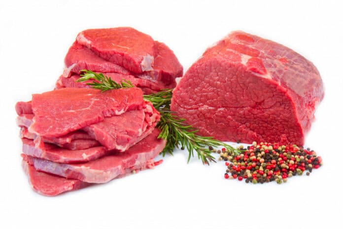 Huge red meat chunk and steak isolated on white