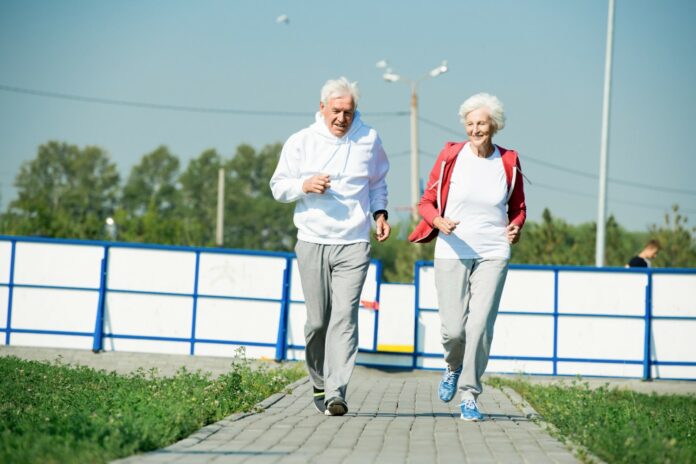 Senior couple exercising outdoors