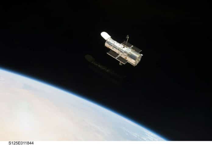 Hubble orbiting more than 300 miles