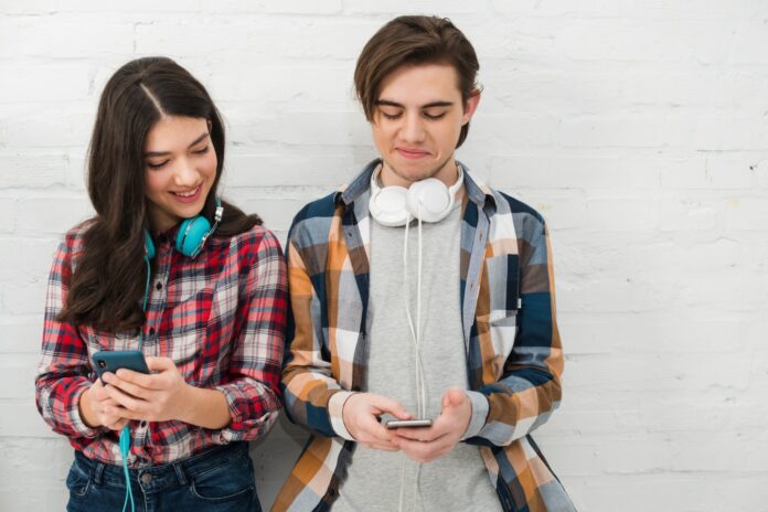 teenagers using smartphone