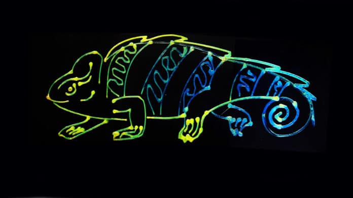 Inspired by the color-changing abilities of chameleons, researchers developed a dynamic and sustainable color-changing ink seen in this 3D printed chameleon illustration created by the research team.