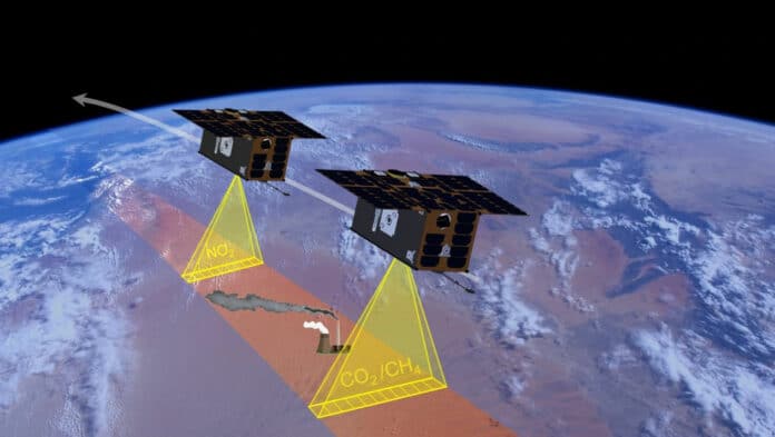 An artist’s impression of the Tango satellites imaging Earth.