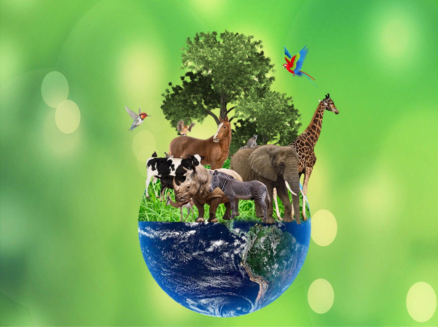 Photo a green globe with animals on it