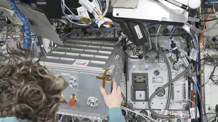 Astronaut and Flight Engineer Loral O’Hara pulled the spaceMIRA box to check connections, opened it to remove packing foam and closed it again.