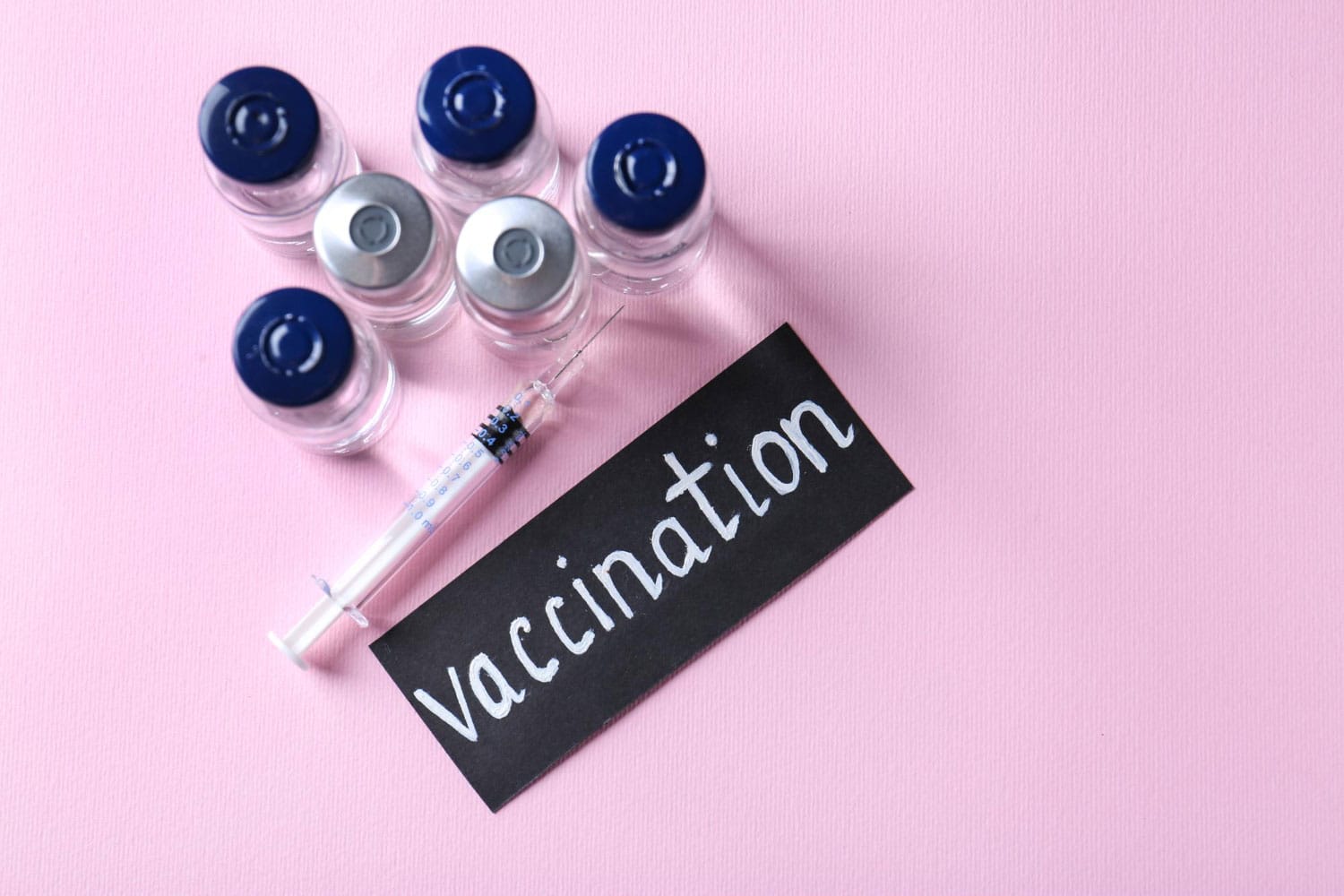 vaccination ampules and syringe