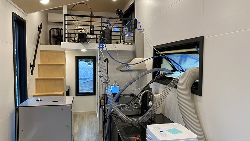 In this Purdue-designed “tiny house” lab, Purdue researchers used instrumentation from GRIMM AEROSOL TECHNIK, a member of the DURAG GROUP, to more accurately study nanocluster aerosol particles emitted while cooking on a gas stove. (Photo provided by Brandon Boor)