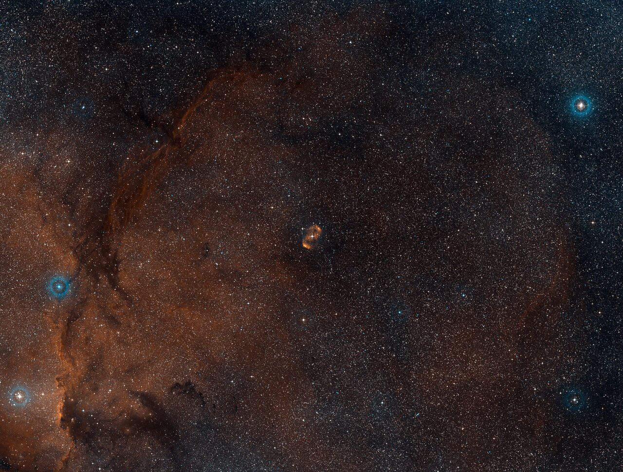 Wide-field view of the region of the sky around the nebula NGC 6164/6165
